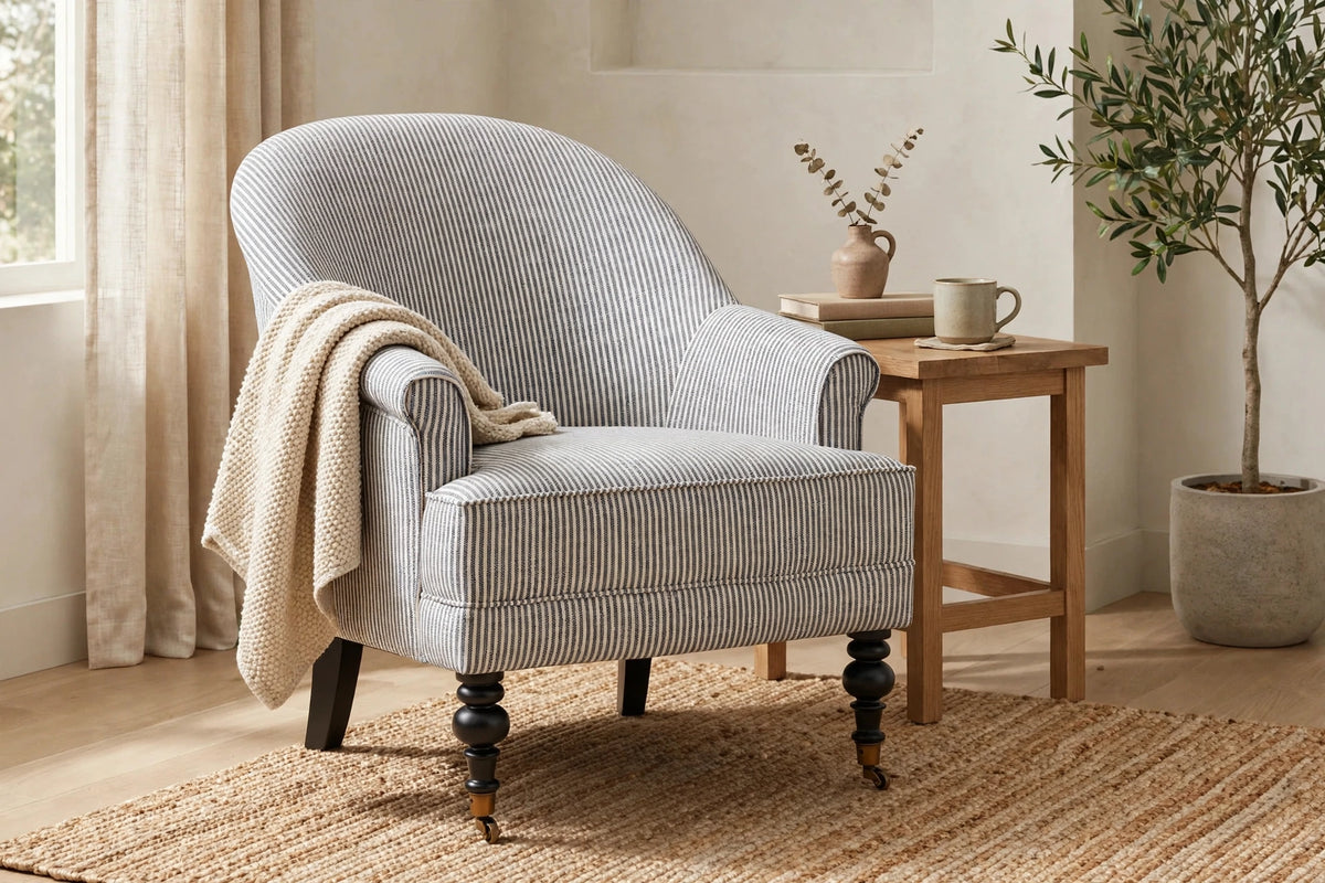 Aerovith pinstripe accent armchair in a living room reading corner