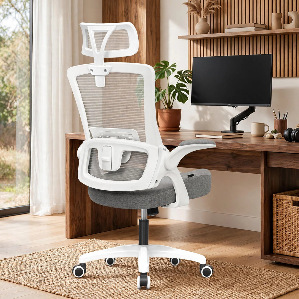 Grey high-back mesh office chair with headrest in a modern home office